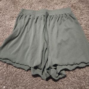 green baggy shorts